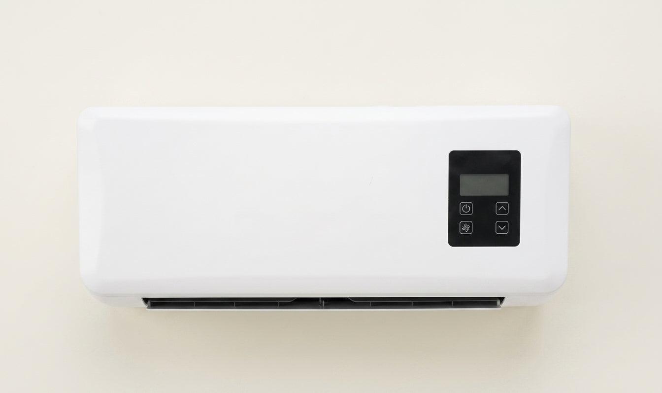 Wall-mounted air conditioner for domestic use, cooling and heating