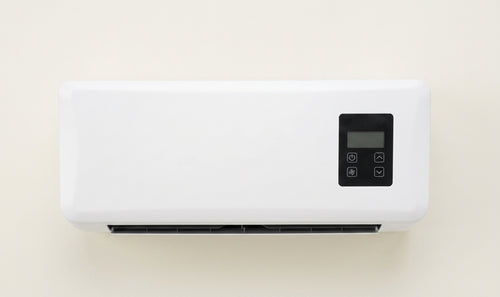Wall-mounted air conditioner for domestic use, cooling and heating